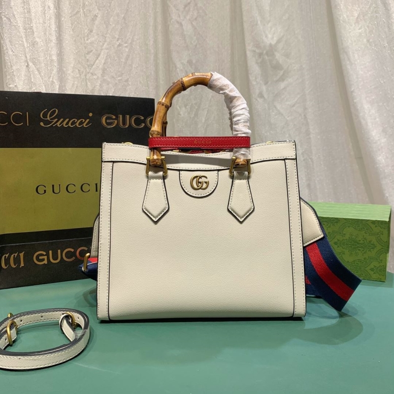 G*u*i top handle bags
